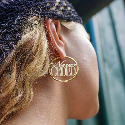 NEVER CEDED HOOP EARRINGS