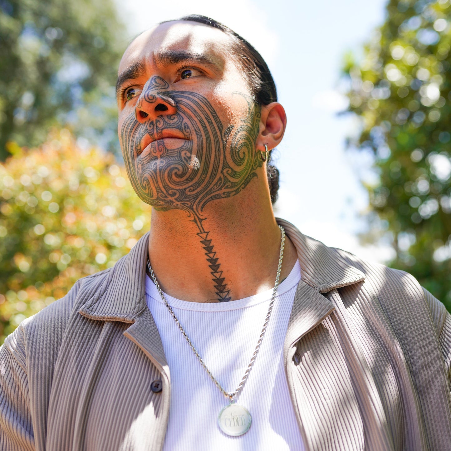 NEVER CEDED MEDALLION NECKLACE