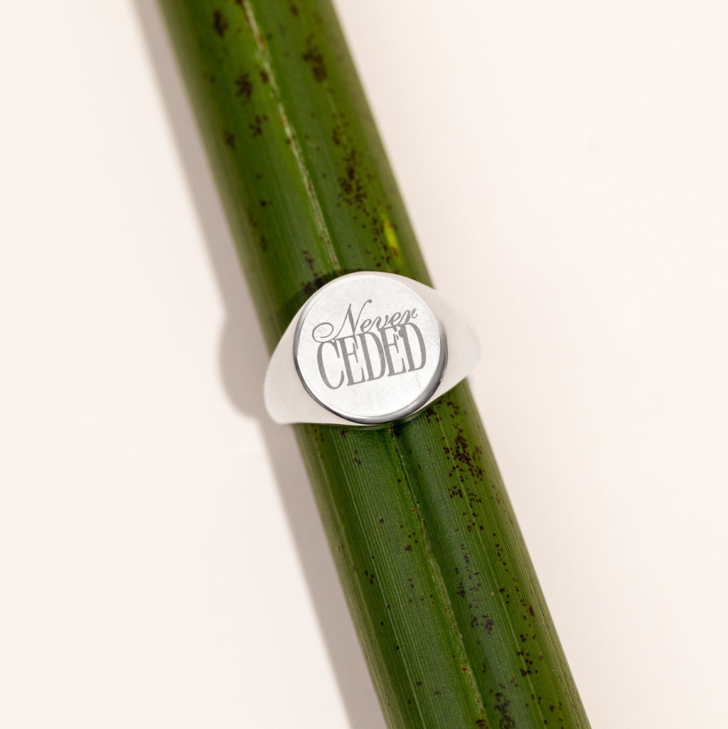 NEVER CEDED SIGNET RING